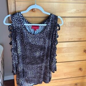 Jennifer Lopez knit open criss cross ladder arm cut out top